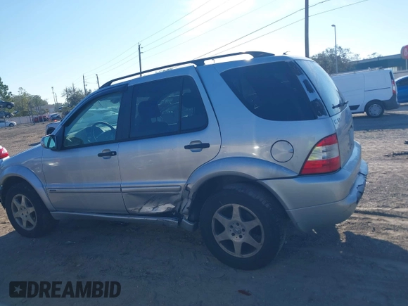 2003 Mercedes-Benz M-Class 3.2L with VIN 4JGAB54E03A383496, listed as a IAAI auction lot 41327756 with 162,973 mi miles. Bid and sale history available at carsss.com. Image 14.