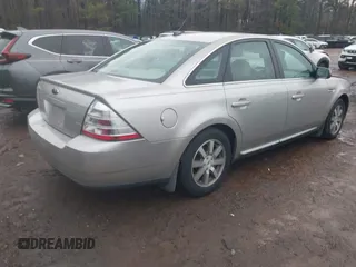 2008 Ford Taurus SEL with VIN 1FAHP24W78G105183, listed as a IAAI auction lot 41441086 with 215,758 mi miles. Bid and sale history available at carsss.com. Image 4.