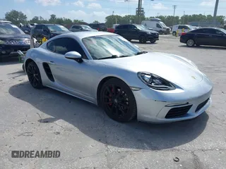 2017 Porsche Cayman S with VIN WP0AB2A87HS285634, listed as a IAAI auction lot 41949961 with 57,422 mi miles and . Bid and sale history available at DreamBid. Image 1.