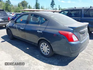2015 Nissan Versa SV with VIN 3N1CN7AP4FL810975, listed as a IAAI auction lot 42643990 with 165,301 mi miles and . Bid and sale history available at DreamBid. Image 3.