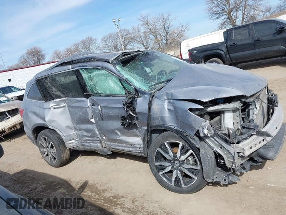 2021 Honda Pilot Elite with VIN 5FNYF6H00MB085678, listed as a IAAI auction lot 41783075 with Not Provided miles and . Bid and sale history available at DreamBid. Image 13.