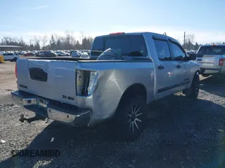 2011 Nissan Titan SL with VIN 1N6AA0EC5BN303931, listed as a IAAI auction lot 41687499 with 243,993 mi miles. Bid and sale history available at carsss.com. Image 4.