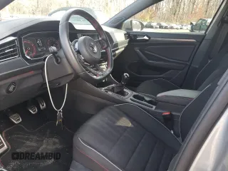 2019 Volkswagen Jetta GLI S z VIN 3VW5T7BU3KM207016, wystawiony jako Copart lot #67631372 z przebiegiem 53 762 mil mil oraz . Historia ofert i sprzedaży dostępna na DreamBid. Obrazek 7.