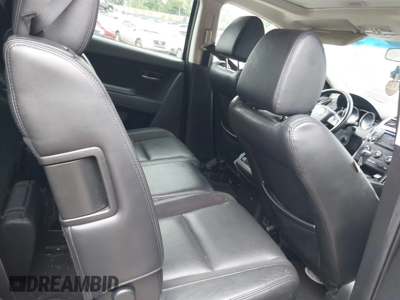 2013 Mazda CX-9 Touring z VIN JM3TB3CVXD0408731, wystawiony jako IAAI lot #42457708 z przebiegiem 168 997 mil mil oraz . Historia ofert i sprzedaży dostępna na DreamBid. Obrazek 8.