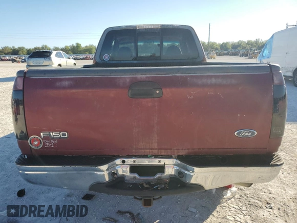 1998 Ford F-150 with VIN 1FTDX1722WNA08817, listed as a Copart auction lot 81589064 with 201,874 mi miles and Salvage title. Bid and sale history available at DreamBid. Image 6.
