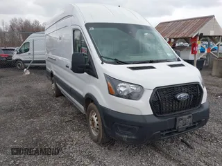 2023 Ford Transit Cargo with VIN 1FTBR3U89PKA07396, listed as a IAAI auction lot 41878907 with 103,402 mi miles and . Bid and sale history available at DreamBid. Image 1.