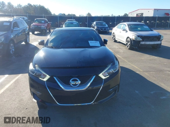 2016 Nissan Maxima SV with VIN 1N4AA6AP0GC385090, listed as a IAAI auction lot 41215857 with 97,072 mi miles and . Bid and sale history available at DreamBid. Image 12.