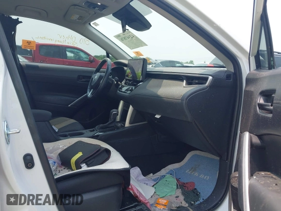2023 Toyota Corolla Cross LE with VIN 7MUCAABG5PV070262, listed as a IAAI auction lot 42347876 with 24,449 mi miles and . Bid and sale history available at DreamBid. Image 5.