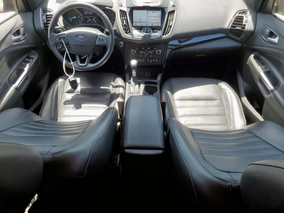 2017 Ford Escape Titanium with VIN 1FMCU0JD3HUA31410, listed as a Copart auction lot 52729025 with 68,256 mi miles and Salvage Title. Bid and sale history available at DreamBid. Image 8.