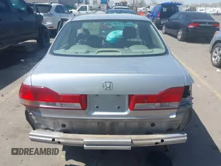 2002 Honda Accord EX z VIN JHMCG56612C026303, wystawiony jako IAAI lot #41992812 z przebiegiem 153 021 mil mil oraz . Historia ofert i sprzedaży dostępna na DreamBid. Obrazek 17.