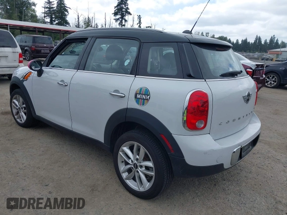 2014 MINI Countryman with VIN WMWZB3C5XEWR37594, listed as a IAAI auction lot 42500466 with 67,589 mi miles and . Bid and sale history available at DreamBid. Image 3.