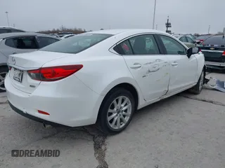 2015 Mazda 6 i Sport with VIN JM1GJ1U68F1170884, listed as a IAAI auction lot 39229424 with 99,317 mi miles. Bid and sale history available at carsss.com. Image 4.