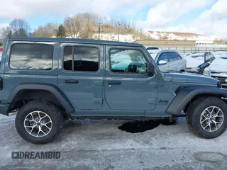 2024 Jeep Wrangler Sport S with VIN 1C4PJXDN2RW306332, listed as a IAAI auction lot 41036573 with 1,785 mi miles and . Bid and sale history available at DreamBid. Image 13.