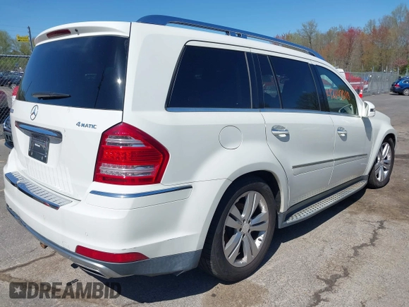 2011 Mercedes-Benz GL-Class GL 450 with VIN 4JGBF7BE4BA667350, listed as a IAAI auction lot 42148010 with 253,571 mi miles. Bid and sale history available at carsss.com. Image 4.