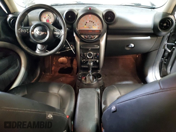 2014 MINI Countryman with VIN WMWZB3C59EWR42124, listed as a Copart auction lot 57830395 with 125,000 mi miles and Salvage title. Bid and sale history available at DreamBid. Image 8.
