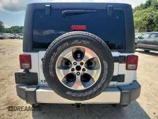 2016 Jeep Wrangler Unlimited Sahara с VIN 1C4HJWEG3GL346528, выставлен на аукционе Copart как лот 65092755 с пробегом 127 393 миль миль и Списание • Salvage title. История ставок и продаж доступна на DreamBid. Изображение 6.