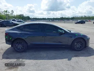 2025 Tesla Model 3 Long Range with VIN 5YJ3E1EA7SF940208, listed as a IAAI auction lot 42433793 with 1,983 mi miles and . Bid and sale history available at DreamBid. Image 14.