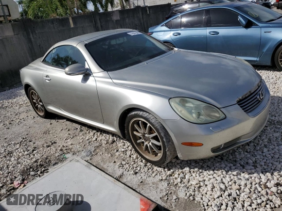 2004 Lexus SC 430 with VIN JTHFN48Y240051291, listed as a Copart auction lot 77631944 with 169,055 mi miles and Salvage Title. Bid and sale history available at DreamBid. Image 4.
