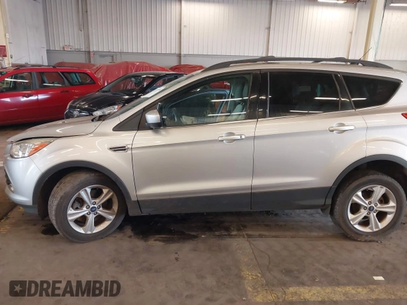2013 Ford Escape SE z VIN 1FMCU9GX8DUD56926, wystawiony jako IAAI lot #41871248 z przebiegiem 36 807 mil mil oraz . Historia ofert i sprzedaży dostępna na DreamBid. Obrazek 14.