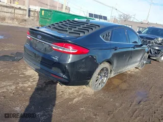 2018 Ford Fusion Hybrid SE with VIN 3FA6P0LUXJR131707, listed as a IAAI auction lot 41490634 with 129,500 mi miles. Bid and sale history available at carsss.com. Image 4.