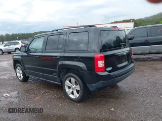 2014 Jeep Patriot Latitude with VIN 1C4NJPFA4ED650283, listed as a IAAI auction lot 41918256 with 160,598 mi miles and . Bid and sale history available at carsss.com. Image 3.