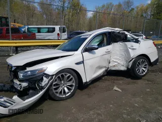 2016 Ford Taurus Limited z VIN 1FAHP2F86GG104703, wystawiony jako Copart lot #52086535 z przebiegiem Nie podano mil oraz Szkody całkowita. Historia ofert i sprzedaży dostępna na DreamBid. Obrazek 1.