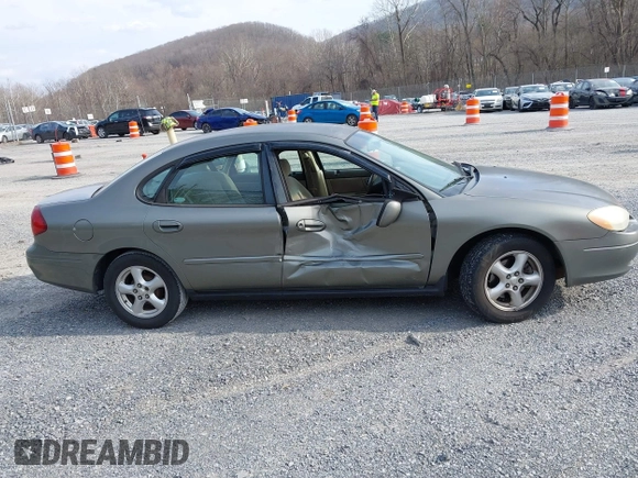 2002 Ford Taurus SE Standard with VIN 1FAFP53U72A145136, listed as a IAAI auction lot 41768868 with 209,765 mi miles and . Bid and sale history available at DreamBid. Image 13.