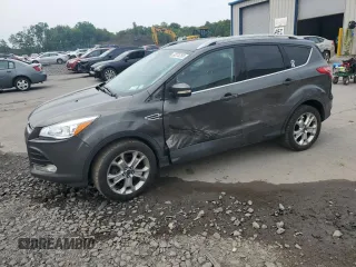 2016 Ford Escape Titanium with VIN 1FMCU9J90GUA01974, listed as a Copart auction lot 60376265 with 177,384 mi miles and Salvage title. Bid and sale history available at DreamBid. Image 1.
