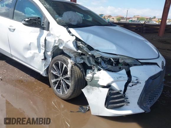 2017 Toyota Corolla L with VIN 2T1BURHE8HC814965, listed as a IAAI auction lot 42387645 with 230,303 mi miles and . Bid and sale history available at DreamBid. Image 6.