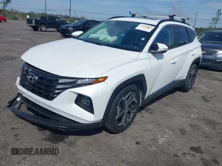 2022 Hyundai Tucson SEL with VIN 5NMJF3AE7NH109495, listed as a IAAI auction lot 41802323 with 38,916 mi miles and . Bid and sale history available at carsss.com. Image 2.