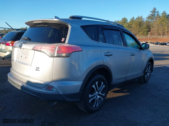 2016 Toyota RAV4 LE with VIN 2T3BFREV2GW477230, listed as a IAAI auction lot 41144507 with 82,425 mi miles. Bid and sale history available at carsss.com. Image 4.