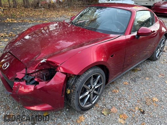 2021 Mazda MX-5 Miata Grand Touring z VIN JM1NDAM74M0461263, wystawiony jako Copart lot #81410634 z przebiegiem 44 551 mil mil oraz Szkoda całkowita • Salvage title. Historia ofert i sprzedaży dostępna na DreamBid. Obrazek 2.