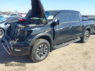 2024 Nissan Titan Pro-4X with VIN 1N6AA1ED9RN113154, listed as a IAAI auction lot 41352672 with 11,753 mi miles and . Bid and sale history available at DreamBid. Image 2.