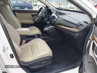 2018 Honda CR-V Touring with VIN 2HKRW2H91JH665241, listed as a IAAI auction lot 42638694 with 62,066 mi miles and . Bid and sale history available at DreamBid. Image 5.