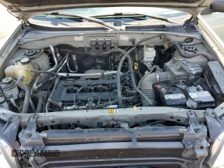 2005 Mazda Tribute i with VIN 4F2YZ02Z65KM01780, listed as a Copart auction lot 70890314 with 119,107 mi miles and Salvage Title. Bid and sale history available at carsss.com. Image 11.
