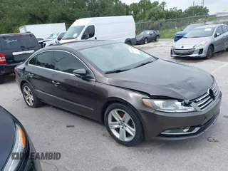 2014 Volkswagen CC Sport with VIN WVWBP7ANXEE530185, listed as a IAAI auction lot 41304487 with 166,706 mi miles and . Bid and sale history available at DreamBid. Image 1.