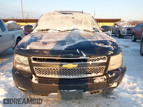 2012 Chevrolet Tahoe LT with VIN 1GNSKBE09CR295291, listed as a IAAI auction lot 41261810 with 133,400 mi miles and . Bid and sale history available at DreamBid. Image 12.