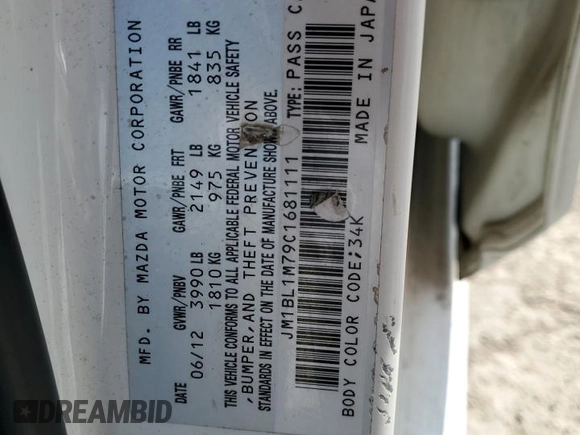 2012 Mazda 3 i Grand Touring with VIN JM1BL1M79C1681111, listed as a Copart auction lot 53619165 with 198,668 mi miles and Salvage Title. Bid and sale history available at DreamBid. Image 12.