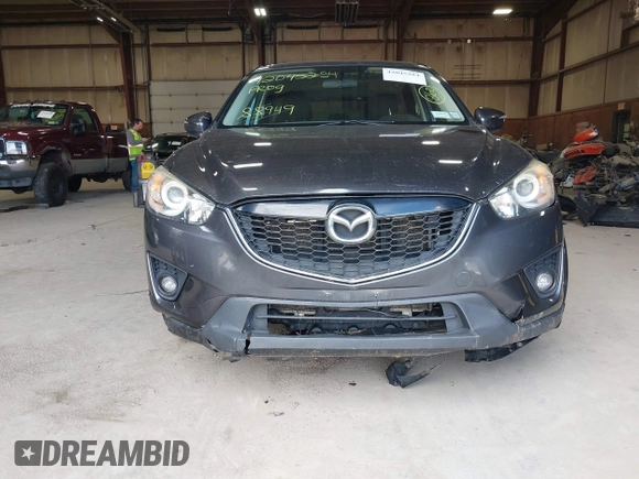 2015 Mazda CX-5 Touring with VIN JM3KE4CY6F0510002, listed as a IAAI auction lot 42045284 with 88,949 mi miles and . Bid and sale history available at DreamBid. Image 6.