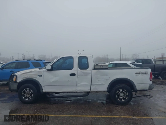 1997 Ford F-150 XL with VIN 1FTDX1863VNB01474, listed as a IAAI auction lot 41446672 with 223,296 mi miles. Bid and sale history available at carsss.com. Image 14.