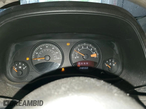 2015 Jeep Patriot Sport with VIN 1C4NJRBB5FD240460, listed as a Copart auction lot 54054755 with 148,502 mi miles and Salvage title. Bid and sale history available at DreamBid. Image 9.