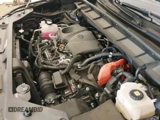 2023 Toyota Highlander Hybrid XLE with VIN 5TDKBRCH5PS567112, listed as a IAAI auction lot 42598870 with 16,459 mi miles and . Bid and sale history available at DreamBid. Image 19.