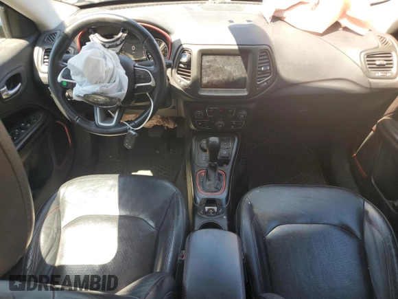 2017 Jeep Compass Trailhawk with VIN 3C4NJDDBXHT668053, listed as a Copart auction lot 63032155 with 94,090 mi miles and Salvage title. Bid and sale history available at DreamBid. Image 8.