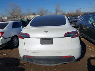 2021 Tesla Model Y Long Range with VIN 5YJYGDEE5MF203175, listed as a IAAI auction lot 41758334 with 63,387 mi miles and . Bid and sale history available at DreamBid. Image 16.