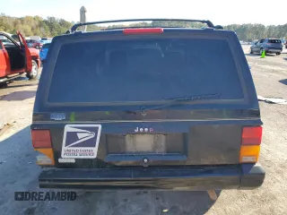 1996 Jeep Cherokee z VIN 1J4FN78S8TL160974, wystawiony jako Copart lot #83425604 z przebiegiem 336 313 mil mil oraz Szkoda całkowita • Salvage title. Historia ofert i sprzedaży dostępna na DreamBid. Obrazek 6.