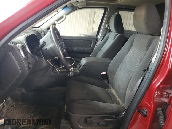 2009 Ford Explorer Sport Trac XLT z VIN 1FMEU51E39UA32542, wystawiony jako Copart lot #72345594 z przebiegiem 149 035 mil mil oraz Szkoda całkowita • Salvage title. Historia ofert i sprzedaży dostępna na DreamBid. Obrazek 7.