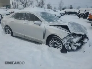 2015 Lincoln MKZ z VIN 3LN6L2JK7FR608177, wystawiony jako Copart lot #85162384 z przebiegiem Nie podano mil oraz Czysty tytuł • Clean title. Historia ofert i sprzedaży dostępna na DreamBid. Obrazek 4.