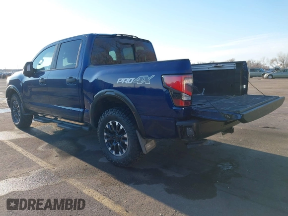 2021 Nissan Titan Pro-4X z VIN 1N6AA1ED1MN517476, wystawiony jako IAAI lot #41422217 z przebiegiem 62 650 mil mil oraz . Historia ofert i sprzedaży dostępna na DreamBid. Obrazek 3.
