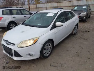 2012 Ford Focus SE with VIN 1FAHP3F21CL216439, listed as a IAAI auction lot 41672015 with 194,143 mi miles. Bid and sale history available at carsss.com. Image 2.