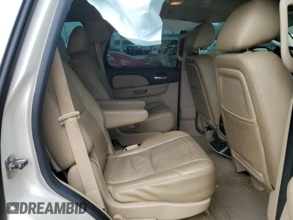 2011 GMC Yukon Denali with VIN 1GKS1EEFXBR313625, listed as a Copart auction lot 72634294 with 129,834 mi miles and Salvage Title. Bid and sale history available at carsss.com. Image 11.